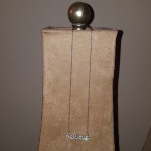 Silver, rhinestone "believe" scripted necklace
